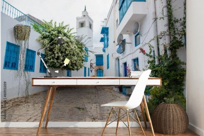 Fototapeta Uliczka z niebieskimi oknami