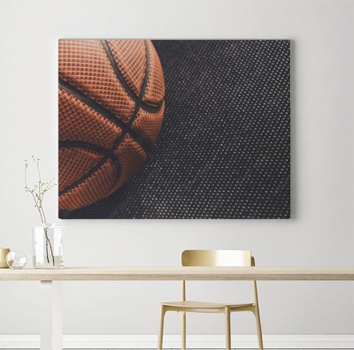 Obraz na płótnie Piłka do koszykówki na ciemnym tle