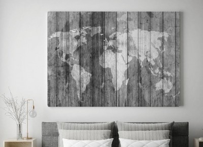 Obraz na płótnie Mapa świata na szarej drewnianej teksturze