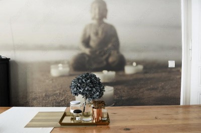 Fototapeta Świątynia z posągiem Buddy i zapalonymi świecami