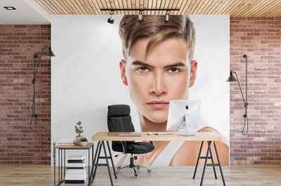 Fototapeta Przystojny młody mężczyzna z modną fryzurą