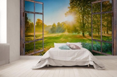 Fototapeta widok wschodu słońca z okna