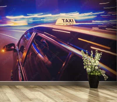 Fototapeta Taksówka w nocy skręca w lewo