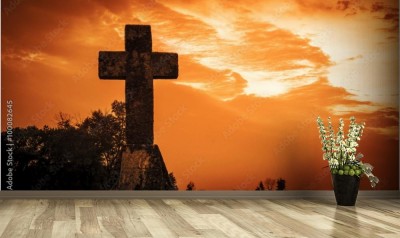 Fototapeta Kamienny krucyfiks na tle czerwonego nieba