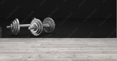 Fototapeta do siłowni - Dwa hantle na ciemnym tle