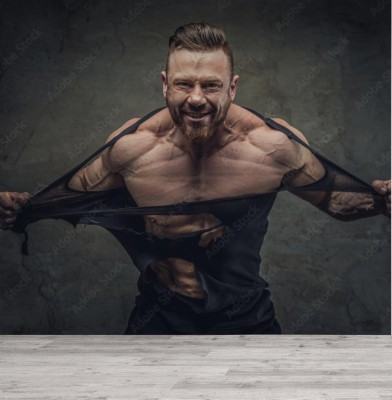 Fototapeta Ogromny kulturysta rozdziera swoje szaty