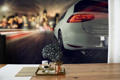 Fototapeta Szybki samochód na tle rozmazanego miasta