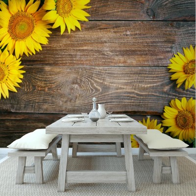 Fototapeta Piękni słoneczniki na drewnianym stole