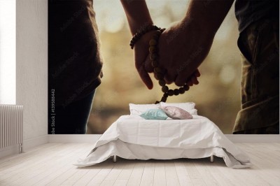 Fototapeta Trzymając różaniec w ręku 