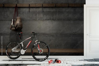 Fototapeta Zużyte zabytkowe rękawice bokserskie wiszące w szatni