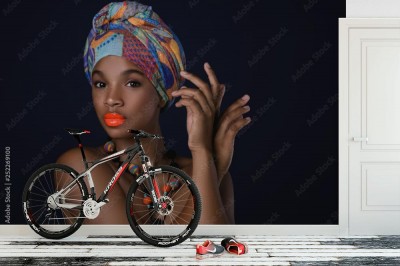 Fototapeta Afrykańska kobieta z kolorowym szalem na głowie