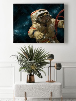 Obraz na płótnie Kosmonauta unosi się w kosmosie