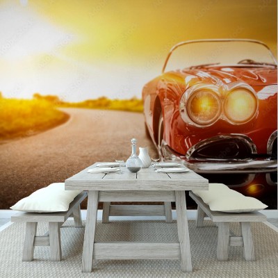 Fototapeta Czerwony samochód i zachód słońca