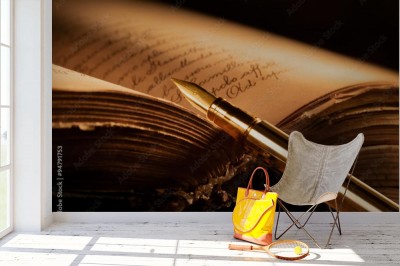 Fototapeta Wieczne pióro ze starą książką