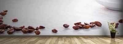 Fototapeta Kawowe fasole i filiżanka kawy na kamiennym talerzu