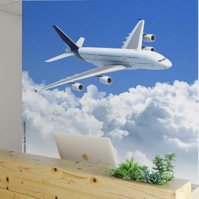 Fototapeta Samolot lecący nad chmurami