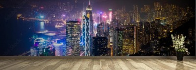 Fototapeta z rozświetlonym na niebiesko miastem w nocy