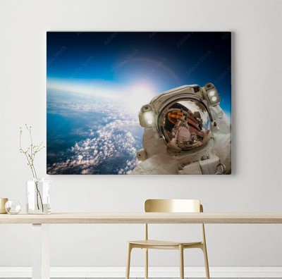 Obrazy do salonu Astronauta w kosmosie