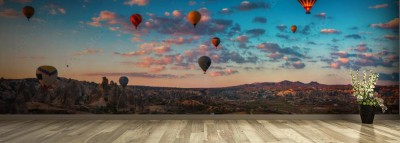 Fototapeta Wschód słońca i balony powietrzne nad doliną