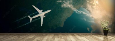 Fototapeta Panoramiczne ujęcie lecącego samolotu z niebem w tle