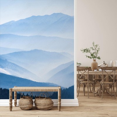 Fototapeta Widnokrąg z zamglonymi górami w niebieskim odcieniu