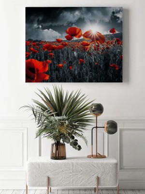 Obraz na płótnie z czerwonym makiem na tle czarno białego krajobrazu
