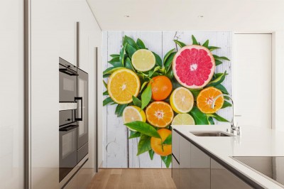 Fototapeta Owoce cytrusa na białym drewnianym tle