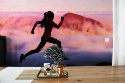 Fototapeta Sylwetka biegacza na pięknym kolorowym tle