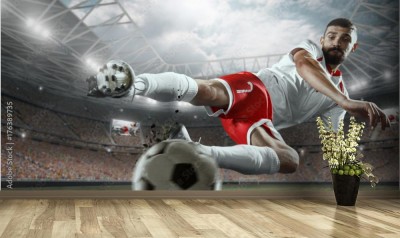 Fototapeta Piłkarz podczas wślizgu