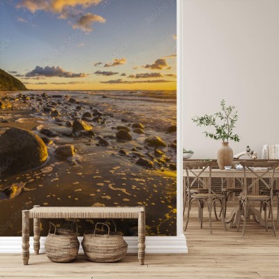 Fototapeta Zachód słońca nad morską plażą