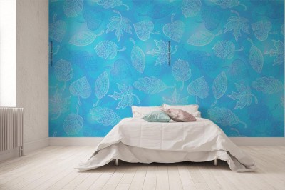 Fototapeta z delikatnym wzorem liści drzewa na błękitnym tle