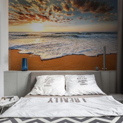 Fototapeta Genialny wschód słońca na plaży oceanu