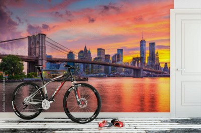 Fototapeta Skyline Dolnego Manhattanu i Most Brookliński w promieniach zachodzącego słońca