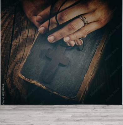 Fototapeta Ręce trzymane na biblii