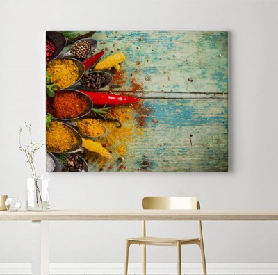Obraz na płótnie Pikantne przyprawy na drewnianym tle