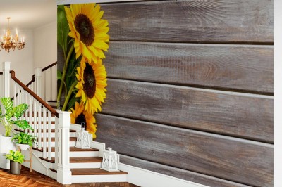 Fototapeta Bukiet słoneczników na ciemnym drewnianym tle