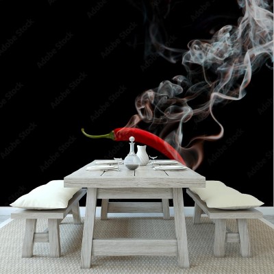 Fototapeta Czerwona papryczka chili na czarnym tle