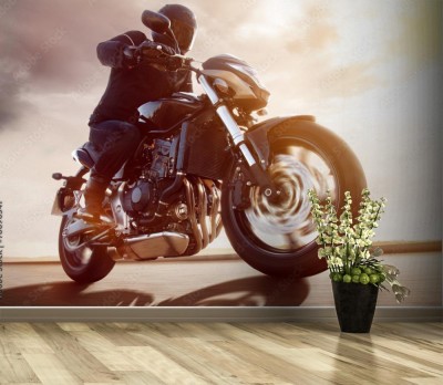 Fototapeta Motocykl o zachodzie słońca