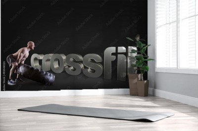przerzucanie-opony-na-czarnym-tle-frazy-motywacyjnej-crossfit