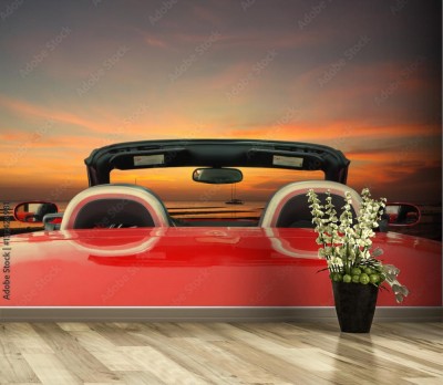 Fototapeta Czerwony samochód z mrocznym tłem