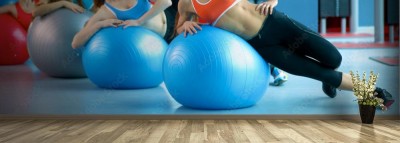 Fototapeta Grupa ludzi w klasie Pilates na siłowni