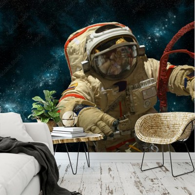 kosmonauta-unosi-sie-w-kosmosie