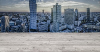 Fototapeta Panorama miasta Warszawa z nowoczesnym wieżowcem o zachodzie słońca