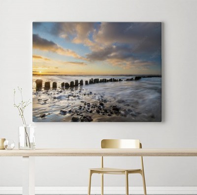 Obraz na płótnie zachód słońca nad morzem