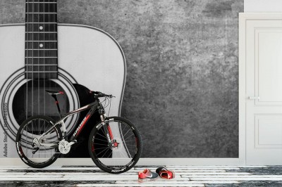 Fototapeta Gitara akustyczna na tle betonowej ściany