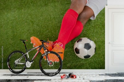 Fototapeta Piłkarz na trawniku