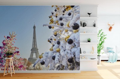 Fototapeta Choinka pokryta śniegiem na tle Wieży Eiffla w Paryżu