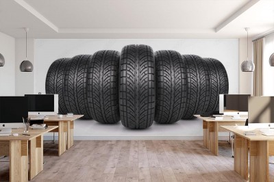 Fototapeta Samochodowe opony w rzędzie na białym tle