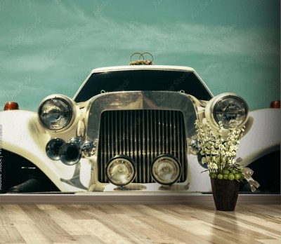 Fototapeta Biała limuzyna ślubna ozdobiona kwiatami w starym stylu