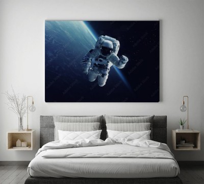 Obraz na płótnie Astronauta na spacerze kosmicznym